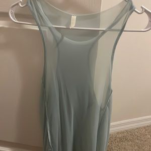 Free People Movement mesh sheet raw hem razor back tank